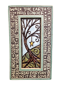 Picture of a tile with a tree in the middle and words of inspiration around the tree